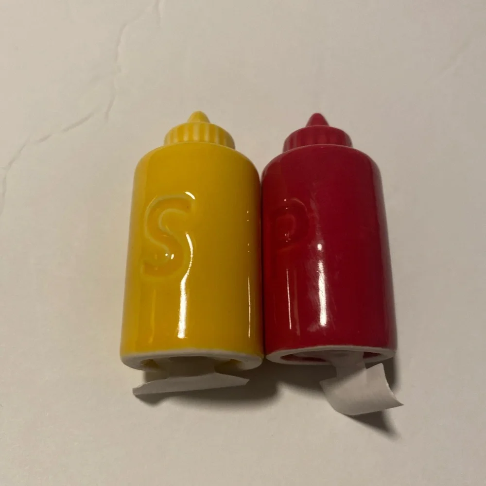 Red and Yellow Condiment Shakers